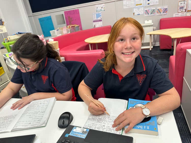 Students completing a literacy task.