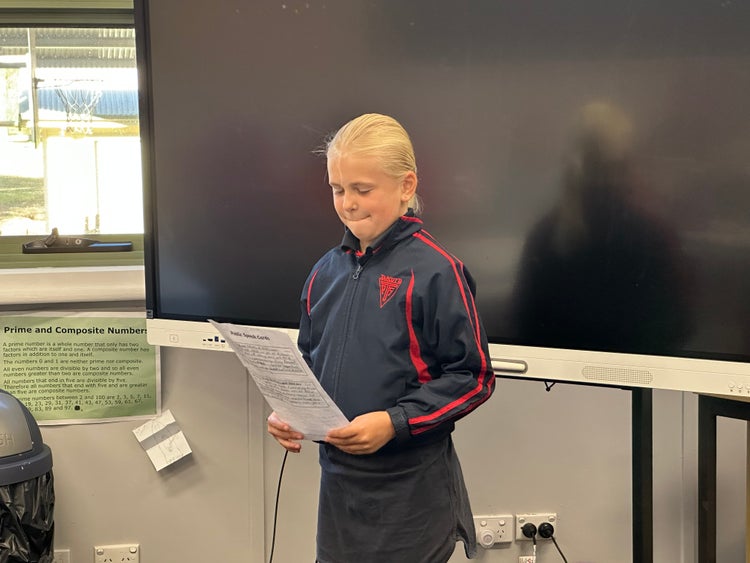 Student competing in public speaking competition